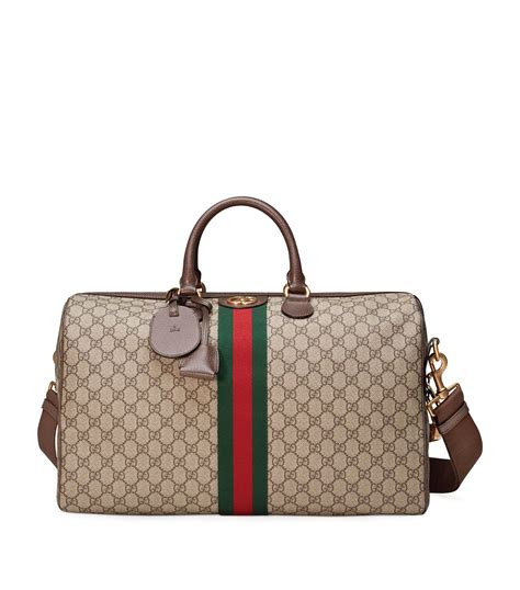 gucci medium ophidia gg carry-on duffle|Gucci duffle handbags.